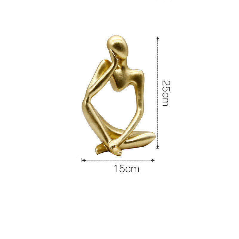 Decorazione artigianale in resina dorata