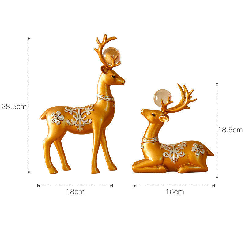 Decorazione artigianale in resina dorata