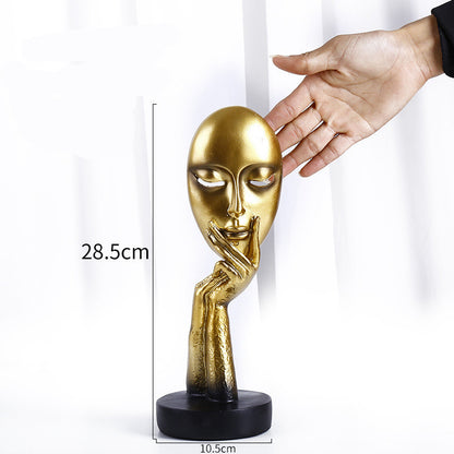 Decorazione artigianale in resina dorata