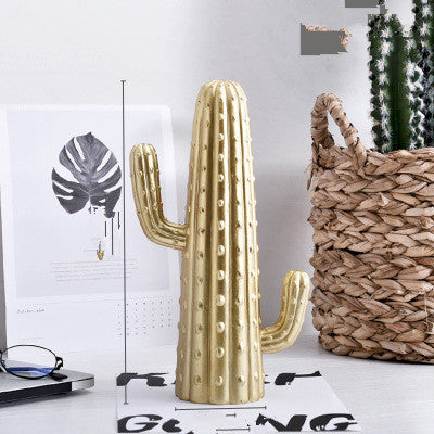 Decorazione artigianale in resina dorata