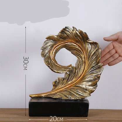 Decorazione artigianale in resina dorata