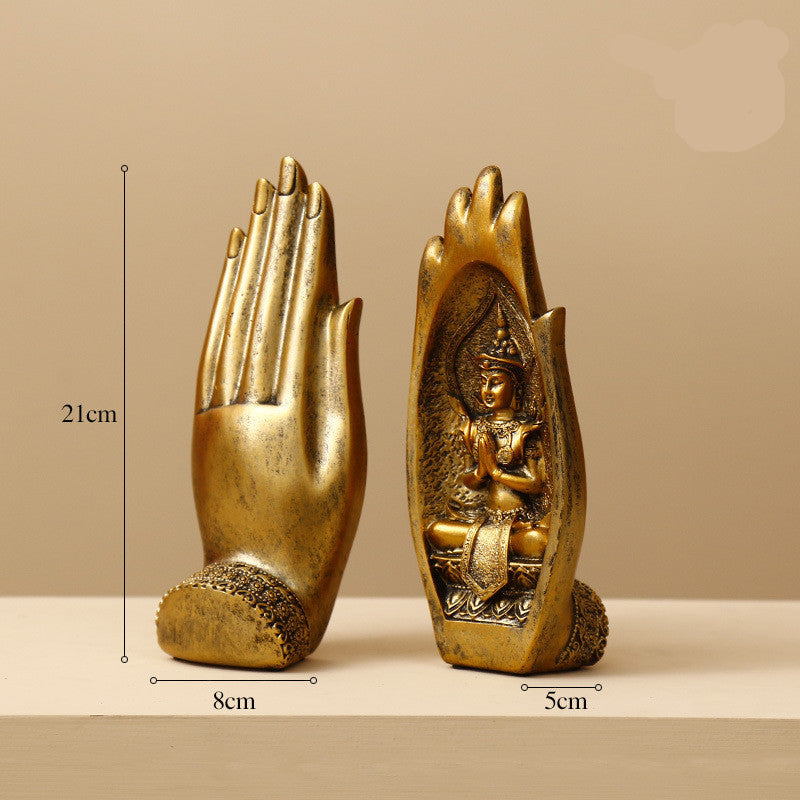 Decorazione artigianale in resina dorata