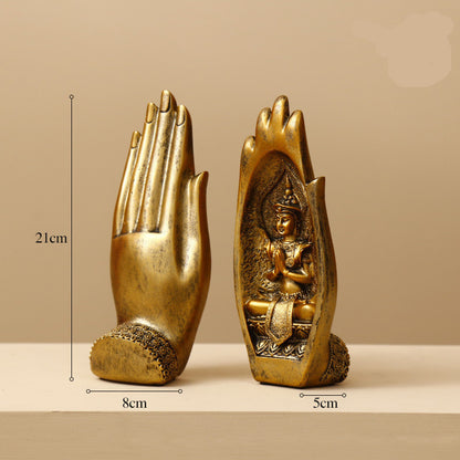 Decorazione artigianale in resina dorata