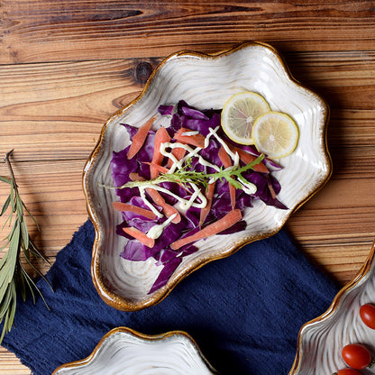 Piatto a forma di conchiglia