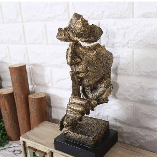 Decorazione artigianale in resina dorata