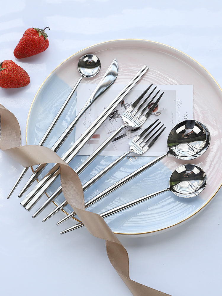 Ensemble de quatre pièces en acier inoxydable