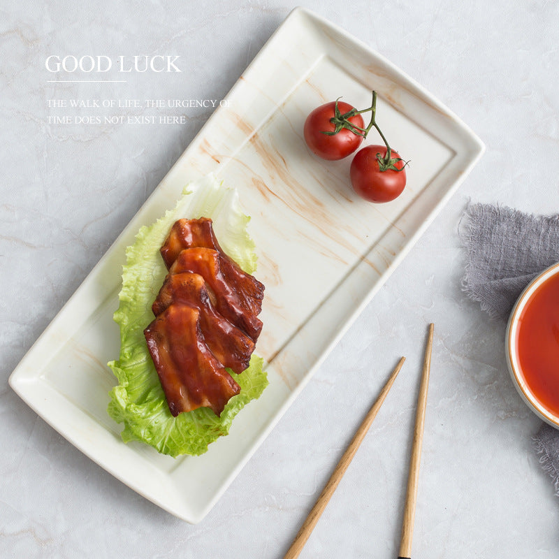 Ciotole e piatti in ceramica marmorizzata